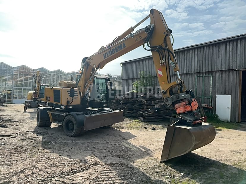 Picture of the Hydrema RB15-MX18 with tiltrotator, quick coupler and excavator bucket